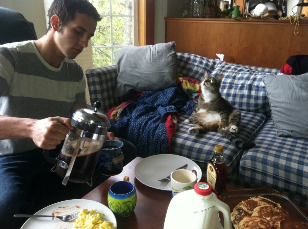 http://cuteboyswithcats.net/post/11175662704/steve-and-henry-having-breakfast-alex-this-cat